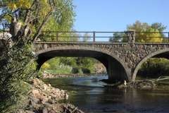 Estes Park Colorado stone bridge, river, and trees