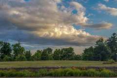 Afternoon-Clouds-at-Minnetrista-with-Rock-Wall-scaled